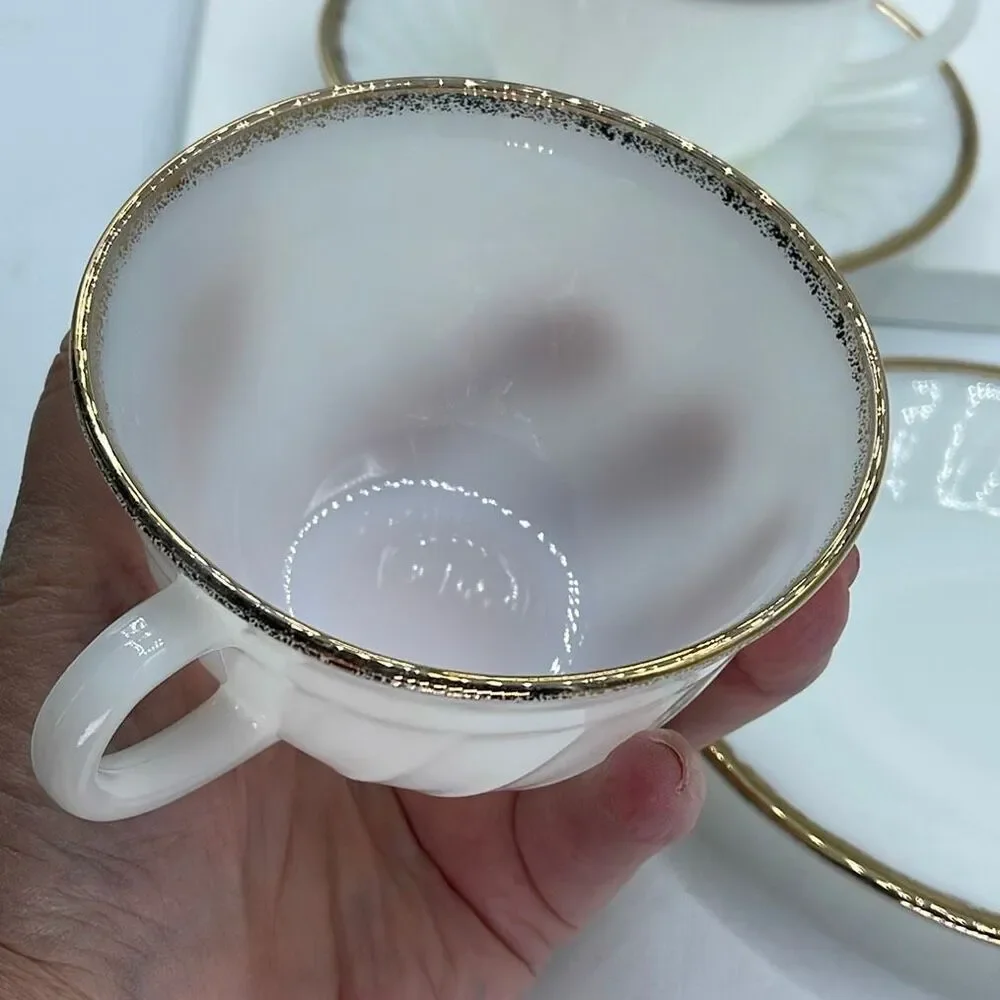 Set of 2 Fire King milk glass swirl pattern cup & saucers.